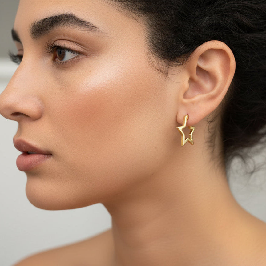 TUCCO STAR SHAPED HALF HOOP EARRINGS