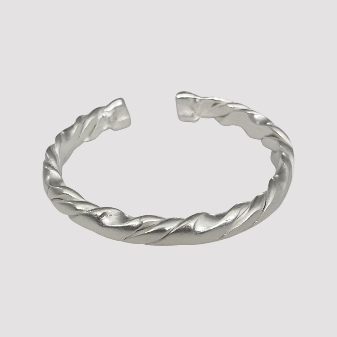 LAMAURI OPENED BRAIDED BANGLE BRACELET - Carol & Co Jewelry